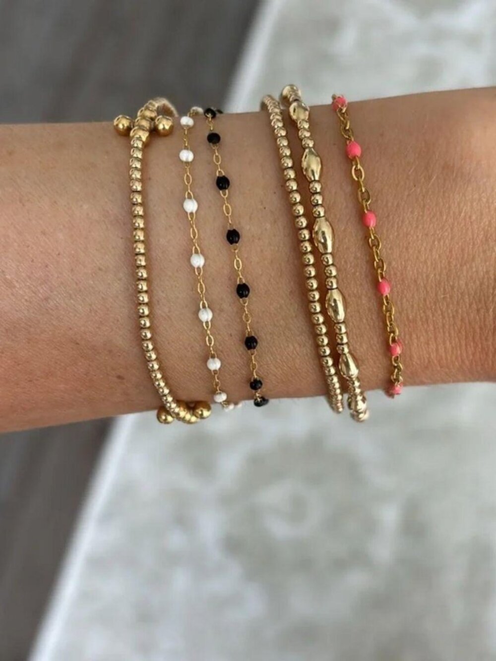 The Raya Dainty gold and pink beaded look adjustable bracelet delicate jeweled c